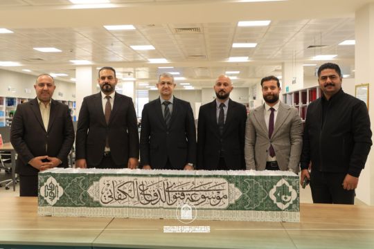 Al-Abbas Holy Shrine Delegation Presents “Encyclopedia of the Fatwa of Defense” to Al-Zahraa University Library